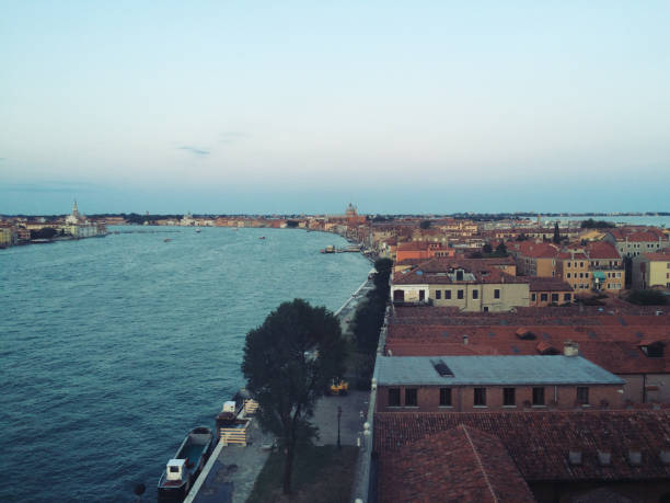 istock High Angle View Of Buildings By Sea Against Sky 961166864