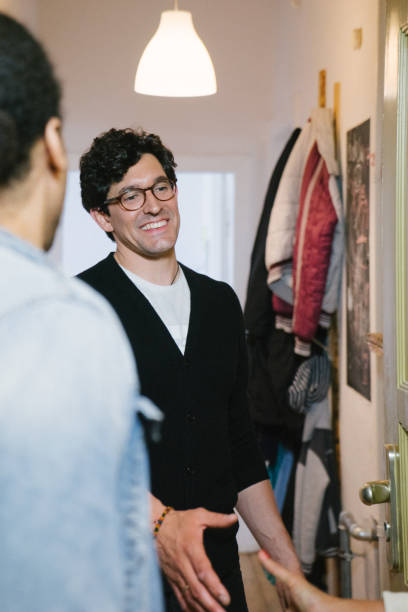 istock Young couple arriving at holiday apartment 961168474