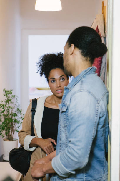 istock Young couple arriving at holiday apartment 961168596