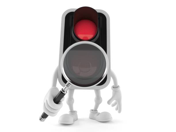 istock Red traffic light character looking through magnifying glass 961178762