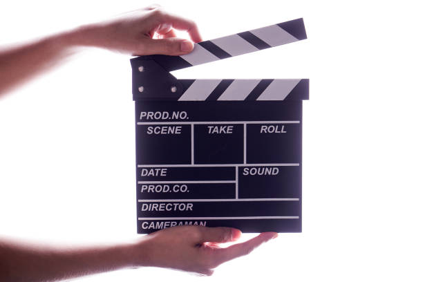 istock Hands holding clapper board or slate film concept. 961188414