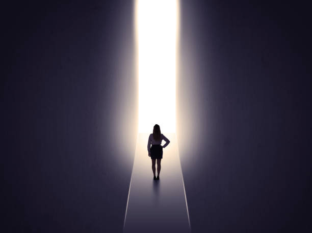 istock woman looking at opened concrete wall 961203430