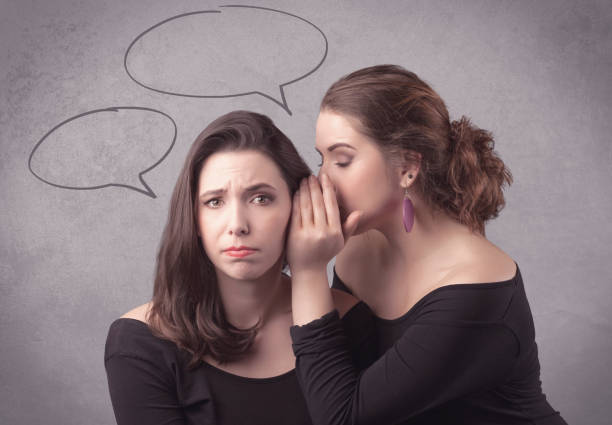 istock girl telling secret things to her girlfriend 961208720