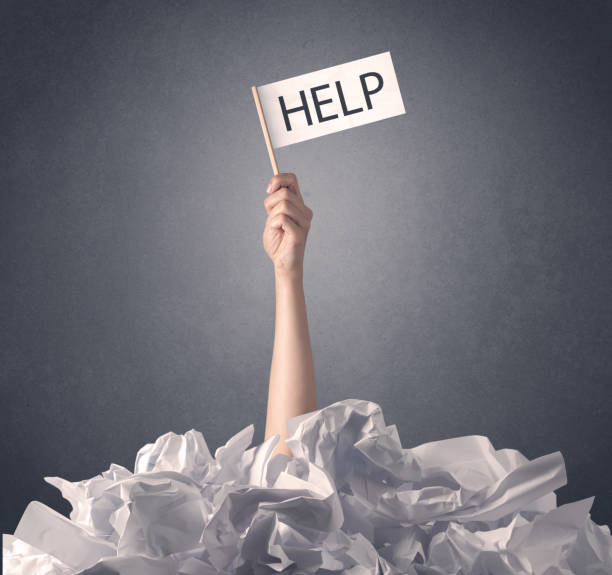 istock Female hand holding help sign 961215462