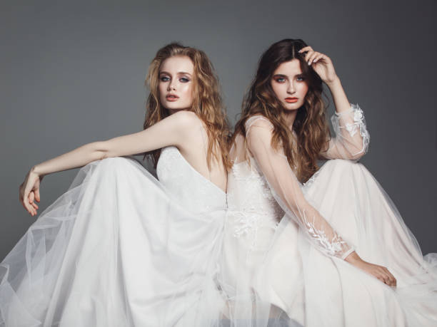 istock Beautiful brides in wedding dresses 961215630