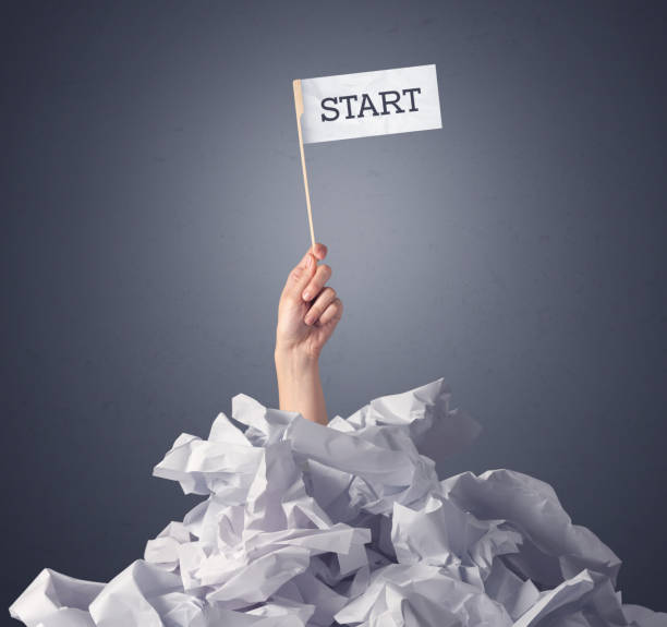 istock Female hand holding start sign 961215634