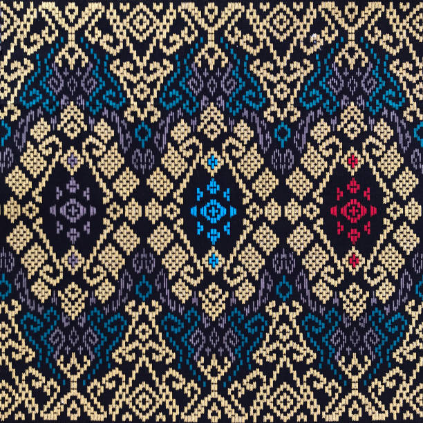 Background, pattern and texture. A beautiful art of Sarawak batik pattern. Sarawak batik is rapidly gaining popularity among Malaysians and tourists. malaysia batik pattern stock pictures, royalty-free photos & images