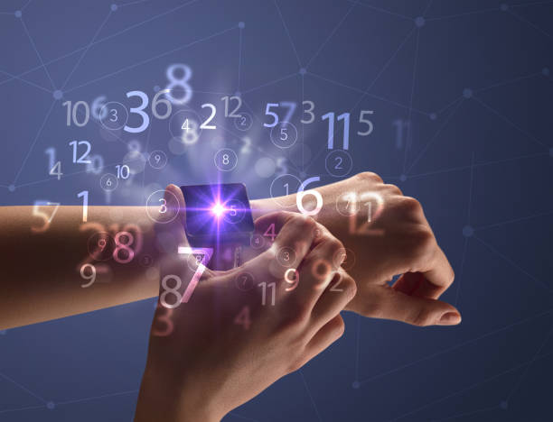 istock Close up hand with smartwatch and numbers 961218248