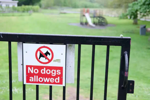 No dogs allowed sign gate children kids play park ground area danger uk
