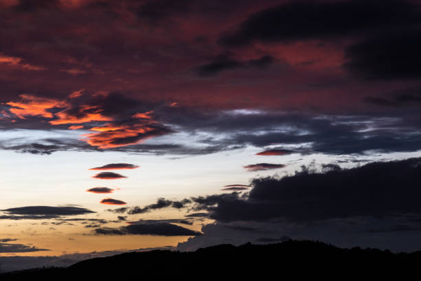 istock Beautiful red clouds at sunset, making abstract shapes 961228454