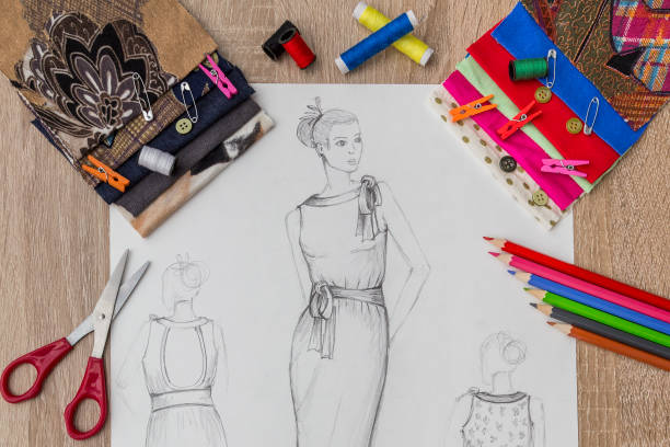 istock Fashion designer studio with sketch on table 961231502