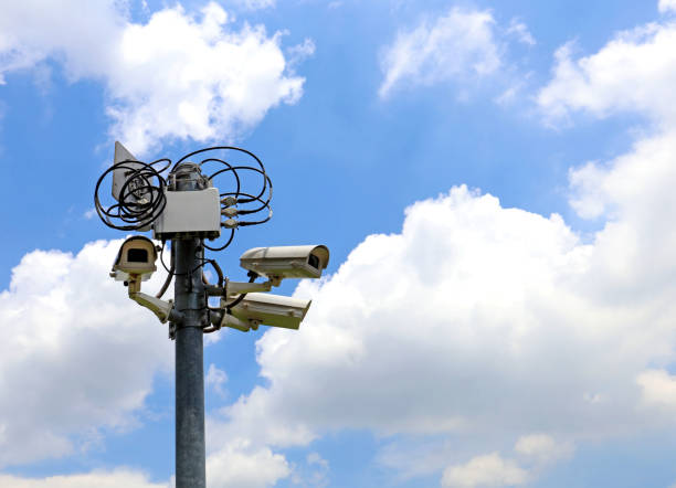 istock cctv security camera with record controller box on blue sky background, eye of sky 961239808