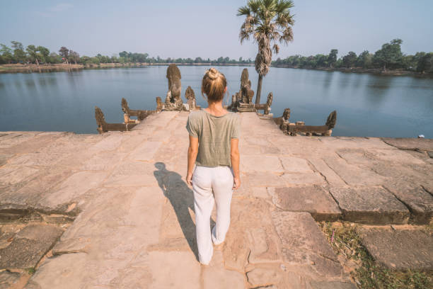istock Asia adventure, female exploring ancient temples 961249300