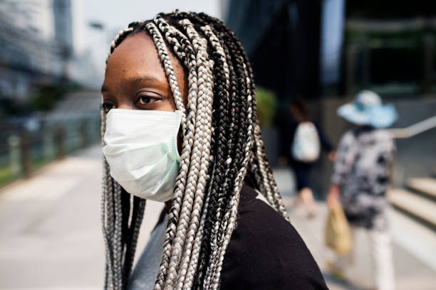 istock Portrait of black woman wearing mask 961256310