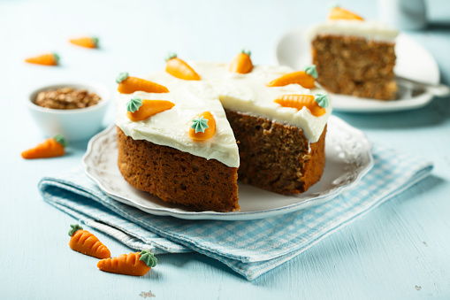 Homemade carrot and walnut cake with cream cheese