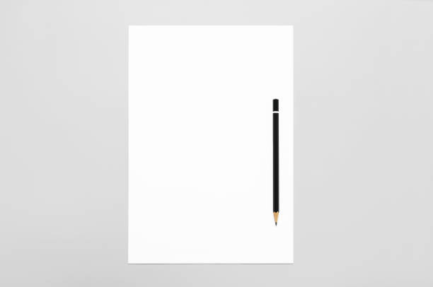 istock Blank sheets of paper and pencil 961266598
