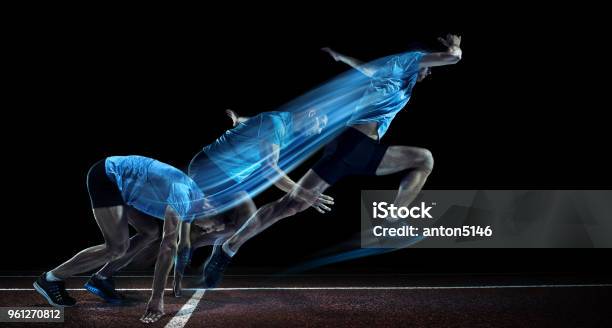 Male Athlete Running On Track Stock Photo - Download Image Now - Running, Sprint, Sprinting