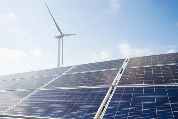 istock Solar panels and wind power, clean energy in nature 961271452