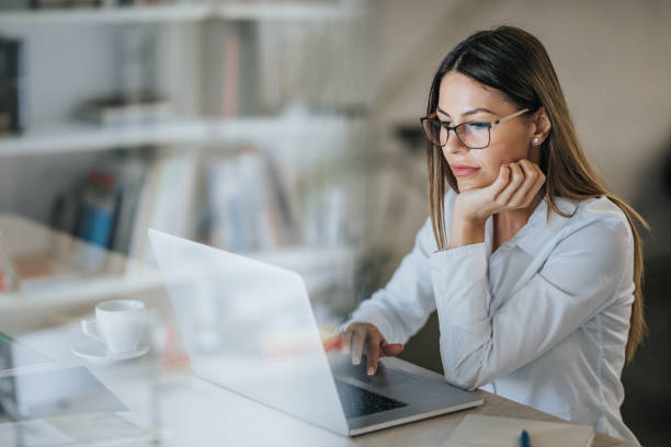istock Young beautiful businesswoman working on her computer in the office. 961271538