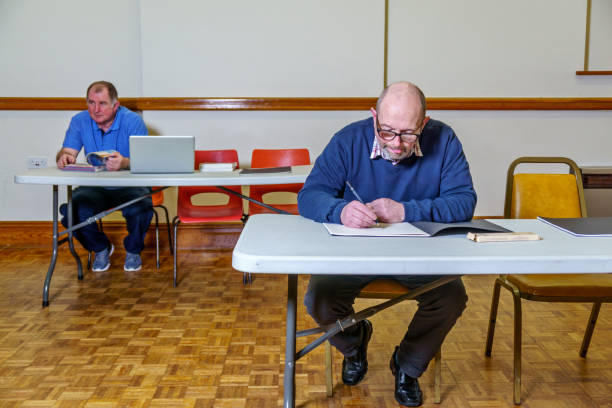 istock Adult education students in classroom 961274410