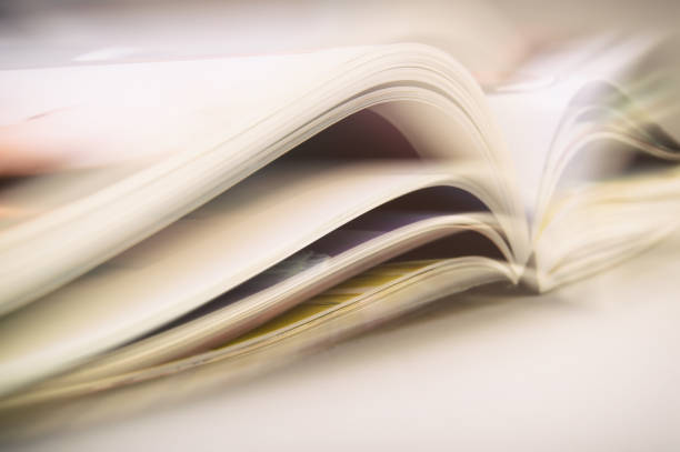 istock Pages of the Open Book Reclining on the Table. 961279234