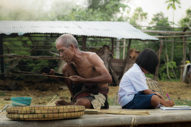 istock Old man and girl with rural life. 961285476