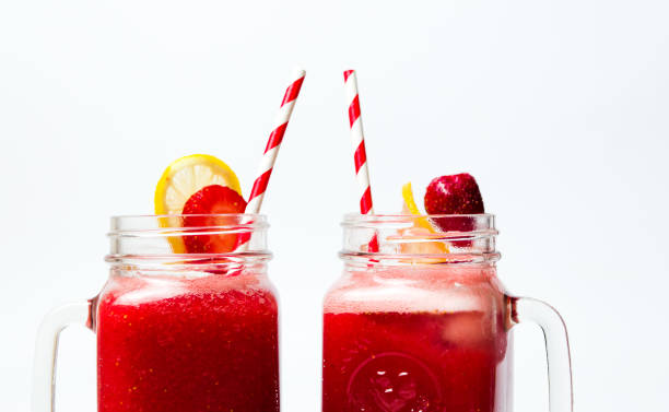 istock Strawberry smoothie in the jar isolated 961293368