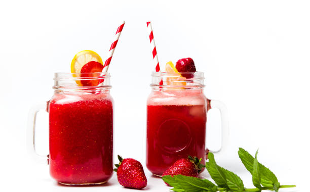 istock Strawberry smoothie in the jar isolated 961293444