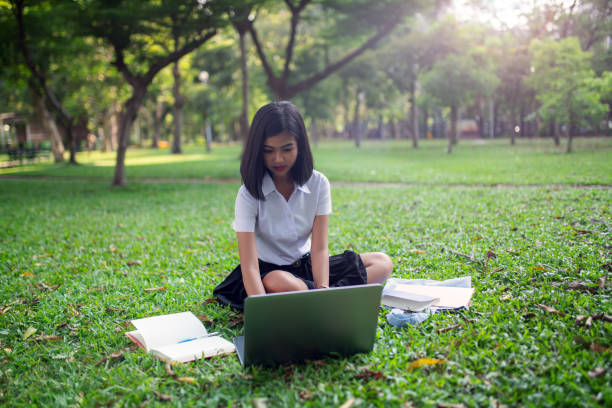 istock Asian Thai university student in a park 961296624