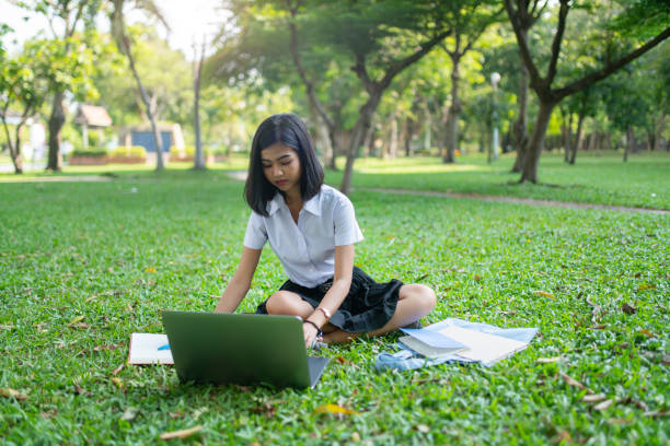 istock Asian Thai university student in a park 961298974