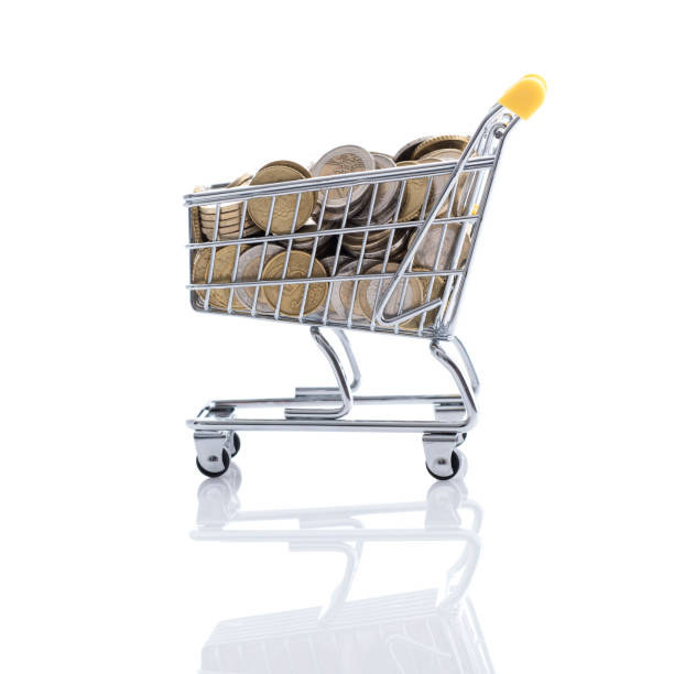 istock Shopping cart filled with currency 961300296