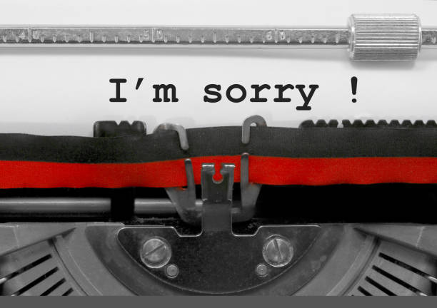 istock I' m sorry text by the old typewriter on white paper 961303574