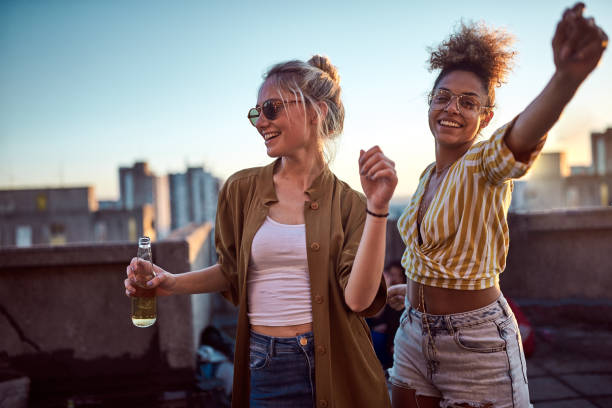 istock Two women dancing at the party. 961304442