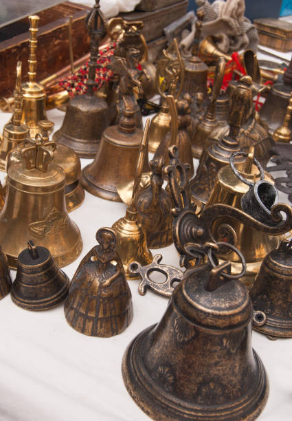 istock Many little bells on the table of the stall 961310304
