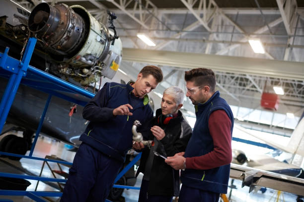istock Aircraft mechanics in the hangar 961312432