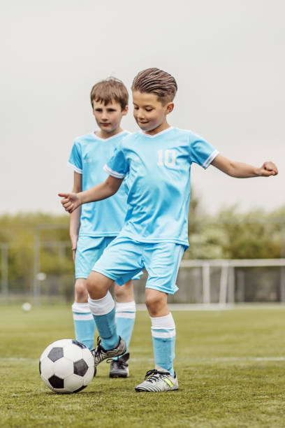 istock A boys soccer team during an intense football training session 961317986