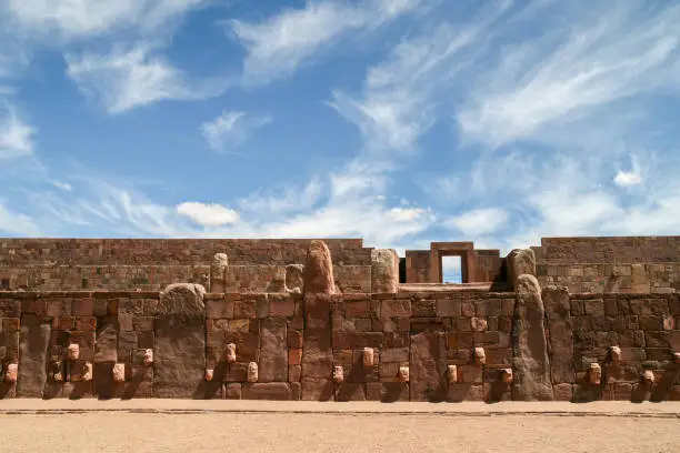 Photo of Architecture wall with stone faces of Tiwanaku
