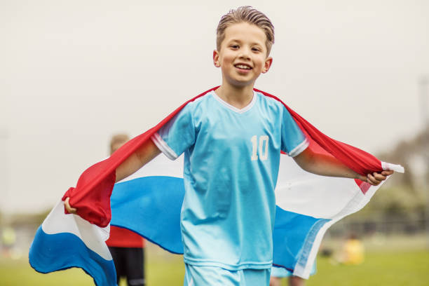 istock A dutch boys soccer team celebrating a victory 961323832