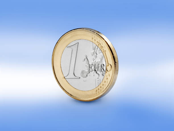 istock One euro coin against blue color 961325906