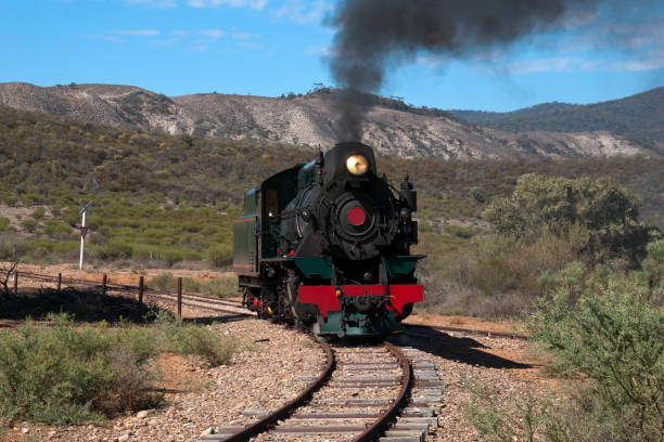 istock View of approaching restored steam engine with semi arid landscape in background 961328170