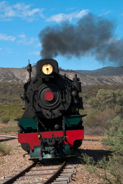 istock View of approaching restored steam engine with semi arid landscape in background 961328296