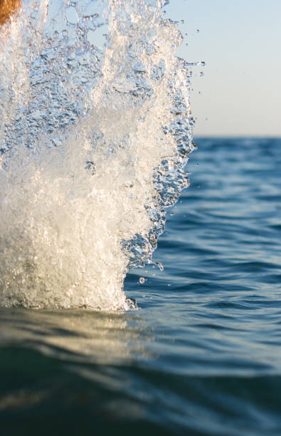 istock large transparent splashes sea water on a Sunny day 961341250