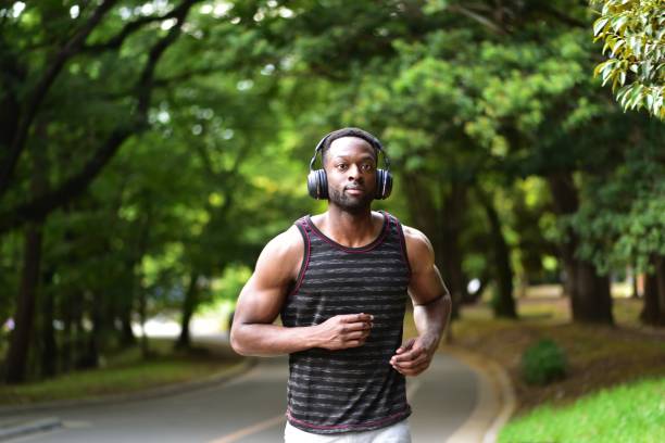 istock Young man running in the park 961344650