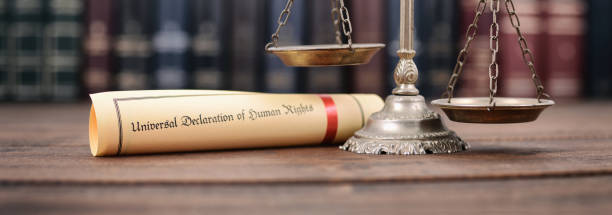 niversal declaration of human rights on a wooden background, human rights concept.