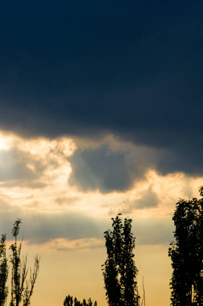 istock Landscape with dramatic light - beautiful golden sunset with saturated sky and clouds. 961355650