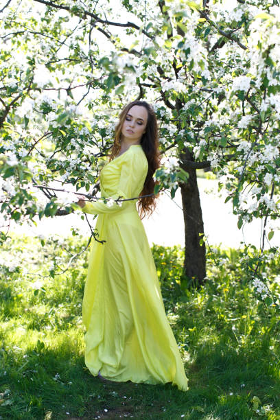 istock girl in a dress in the spring 961358096