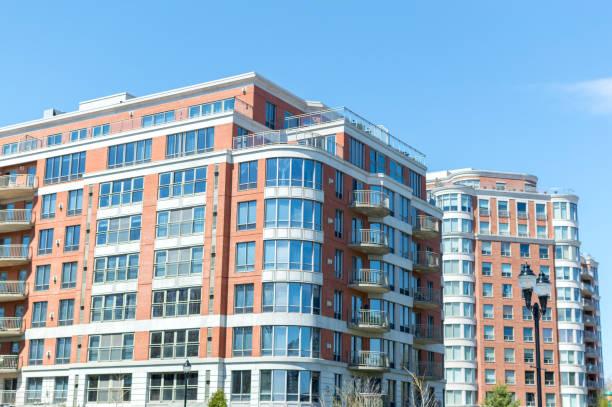 istock Modern condo buildings with huge windows 961360400