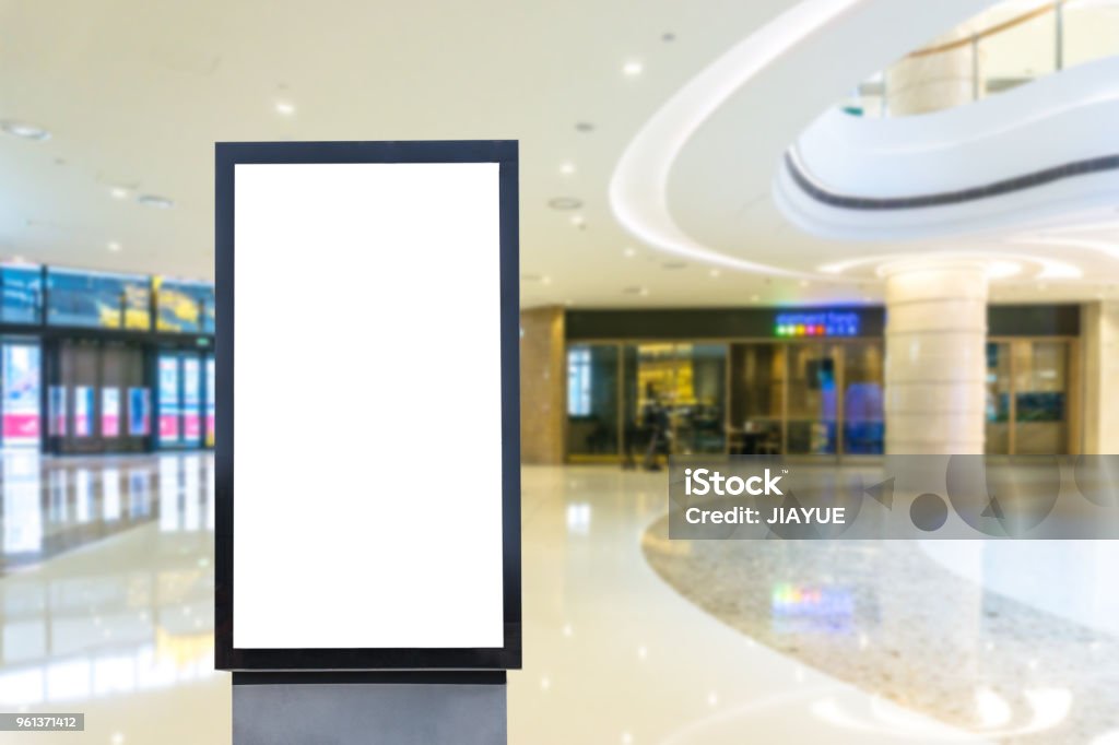 blank poster in shopping mall blank poster Shopping Mall Stock Photo