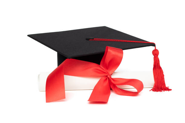 istock Graduation cap and certificate with red tassel isolated on white background 961381252