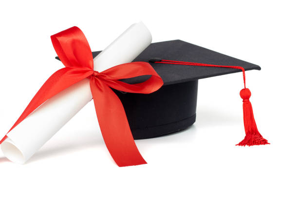 istock Graduation cap with red tassel isolated on white background 961381264